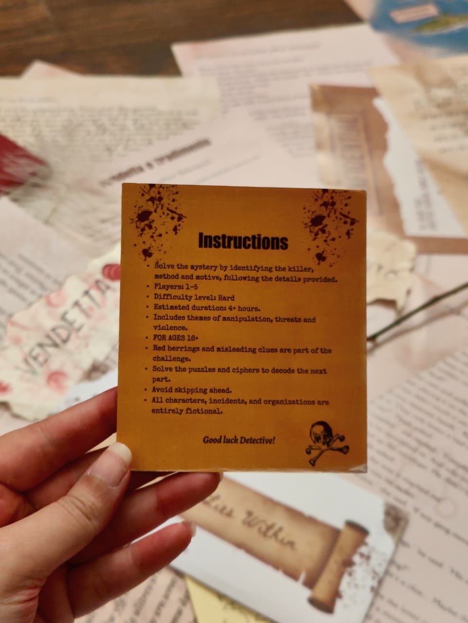 Hand holding a card with 'Instructions' text on an out-of-focus background